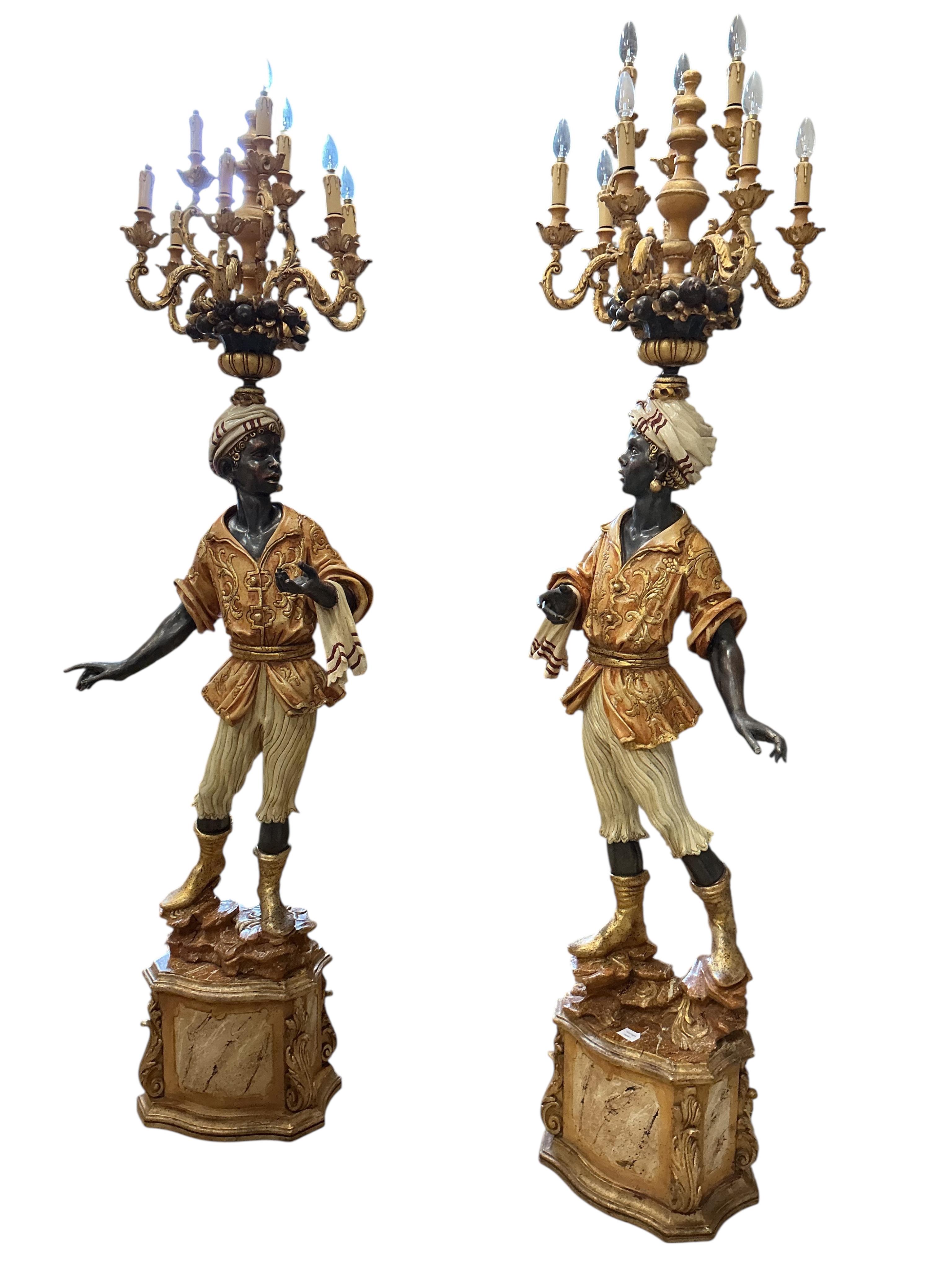 A pair of Venetian style Blackamoor floor lamps, height 218cm